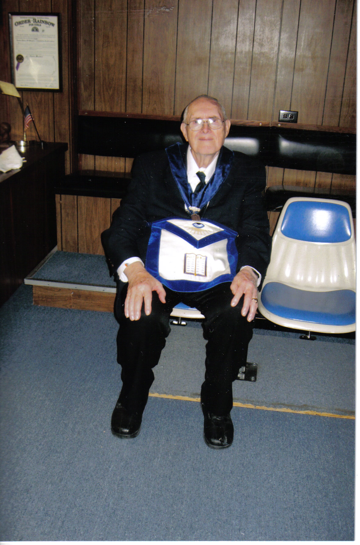 Earl  chaplain  seated in hhis office  4 