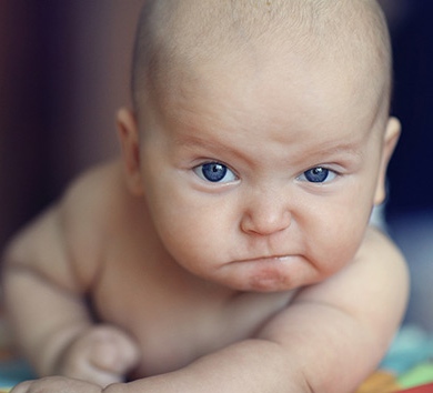 Baby infant funny angry face