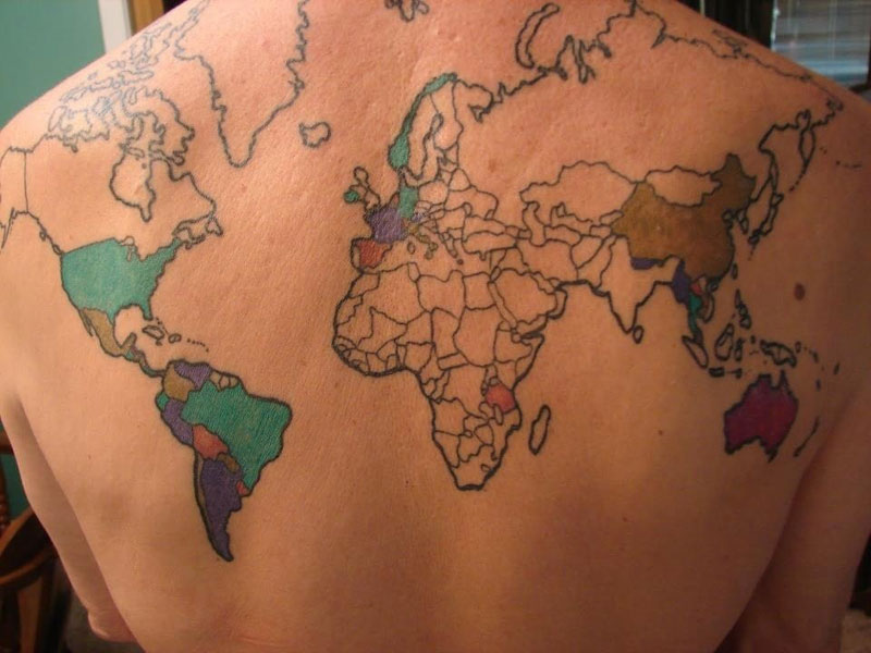 Tattoo of world with countries visited colored in